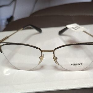 Versace Women's Glasses in Gold and Black